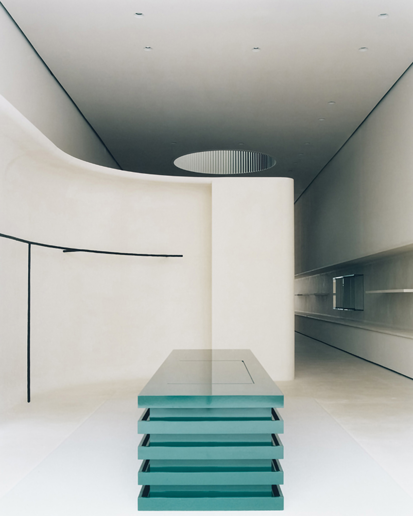 jil sander hamburg store's sculptural display elements shape hybrid boutique interiors