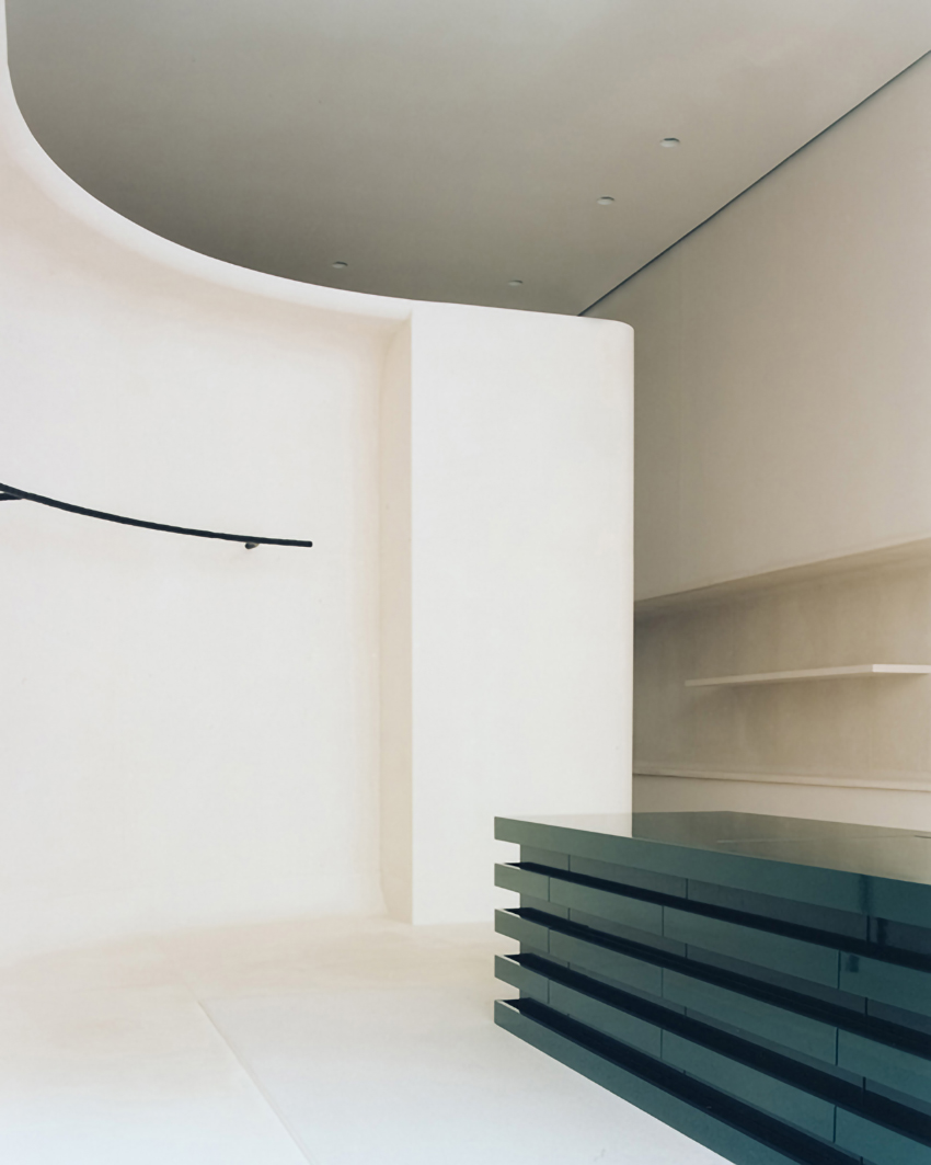 jil sander hamburg store's sculptural display elements shape hybrid boutique interiors