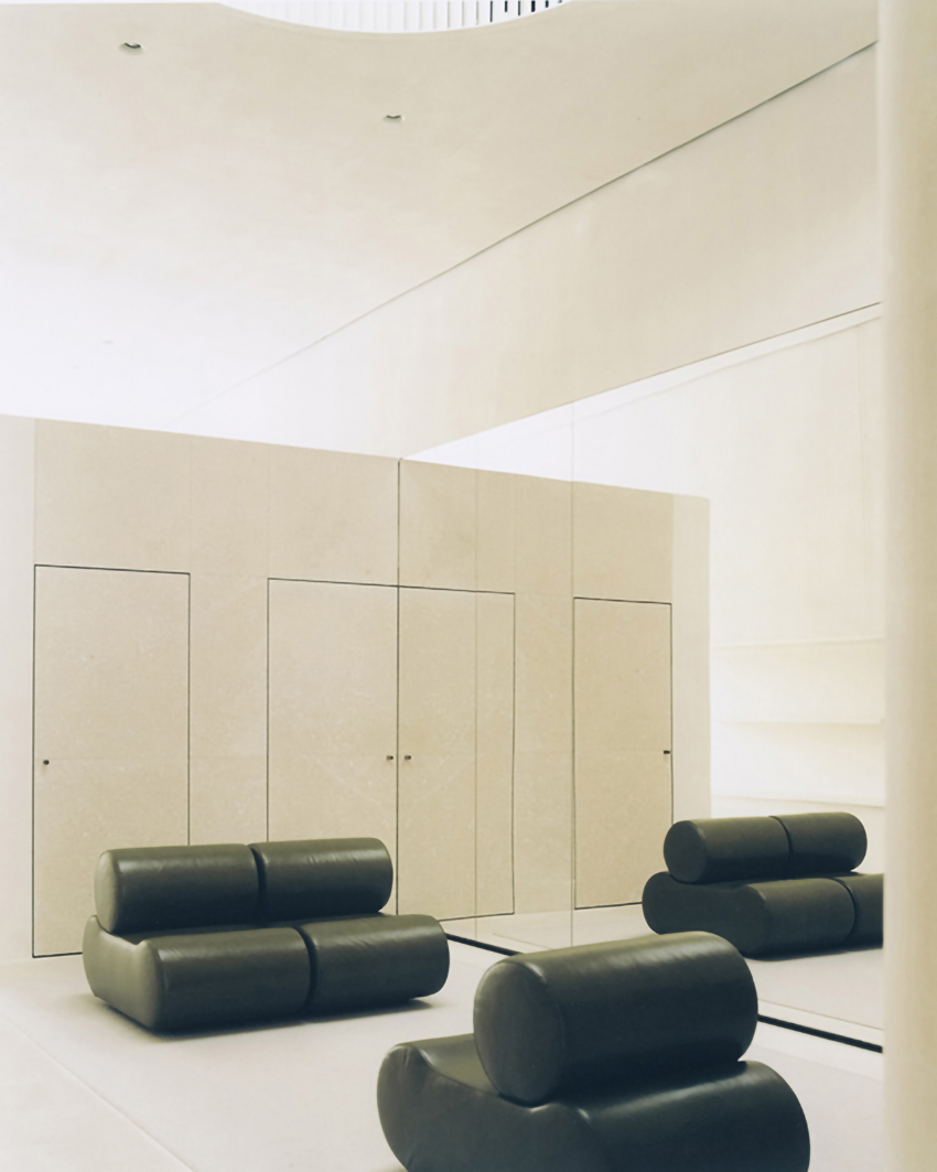 jil sander hamburg store's sculptural display elements shape hybrid boutique interiors