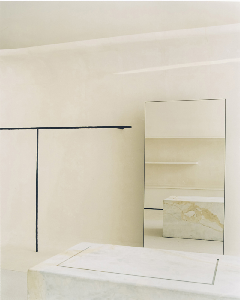 jil sander hamburg store's sculptural display elements shape hybrid boutique interiors