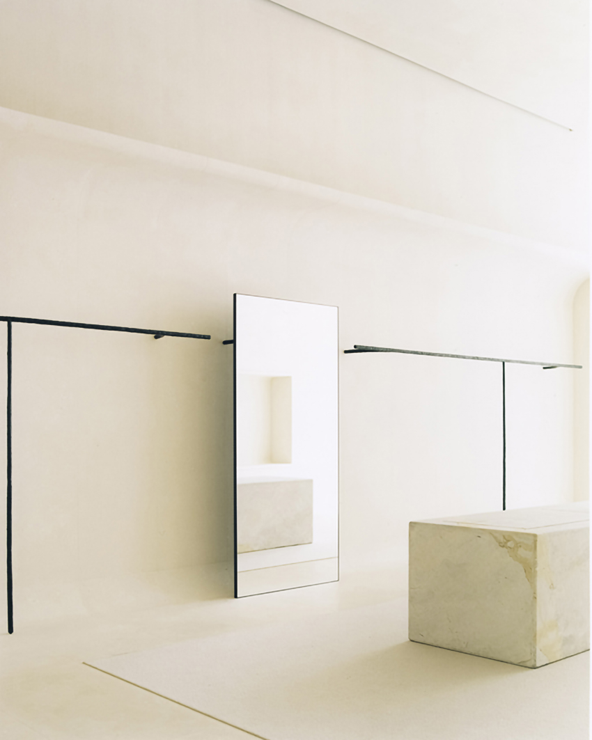 jil sander hamburg store's sculptural display elements shape hybrid boutique interiors