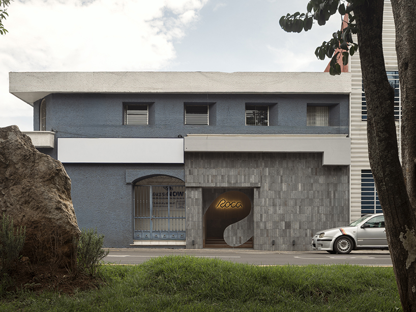 granite and fabric shape an interplay of solidity and fluidity at roca pilates studio in mexico
