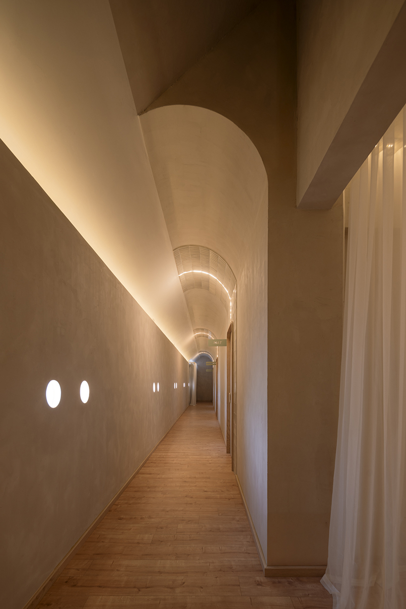 granite and fabric shape an interplay of solidity and fluidity at roca pilates studio in mexico