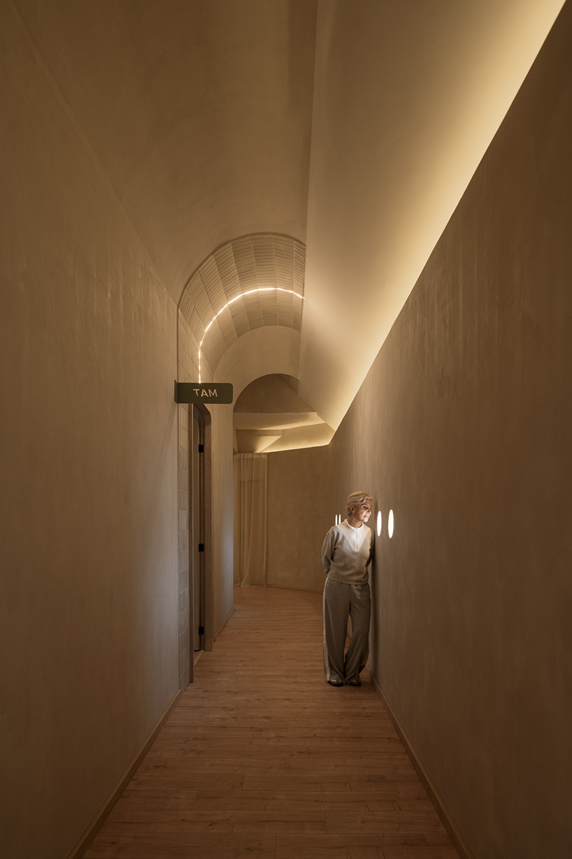 granite and fabric shape an interplay of solidity and fluidity at roca pilates studio in mexico