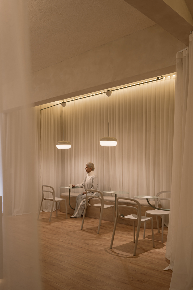 granite and fabric shape an interplay of solidity and fluidity at roca pilates studio in mexico