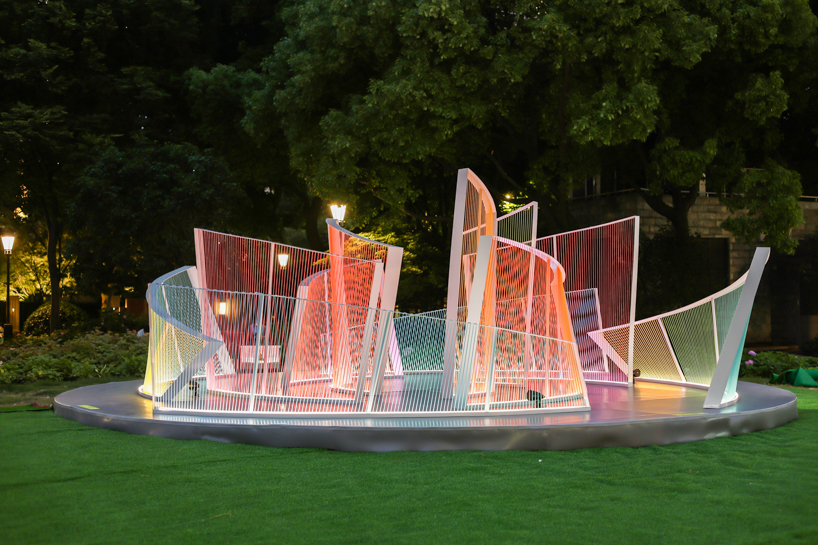 nylon ropes shape colorful curved contours for mars studio's