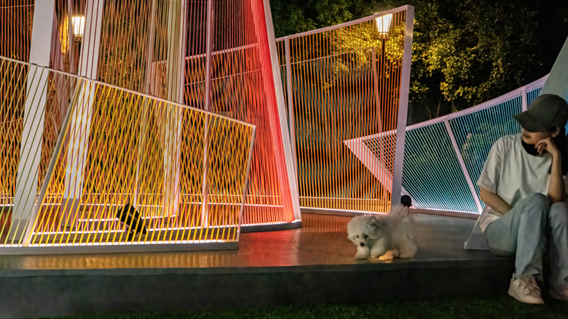 overlapping nylon ropes shape colorful curved contours for mirage installation in shanghai