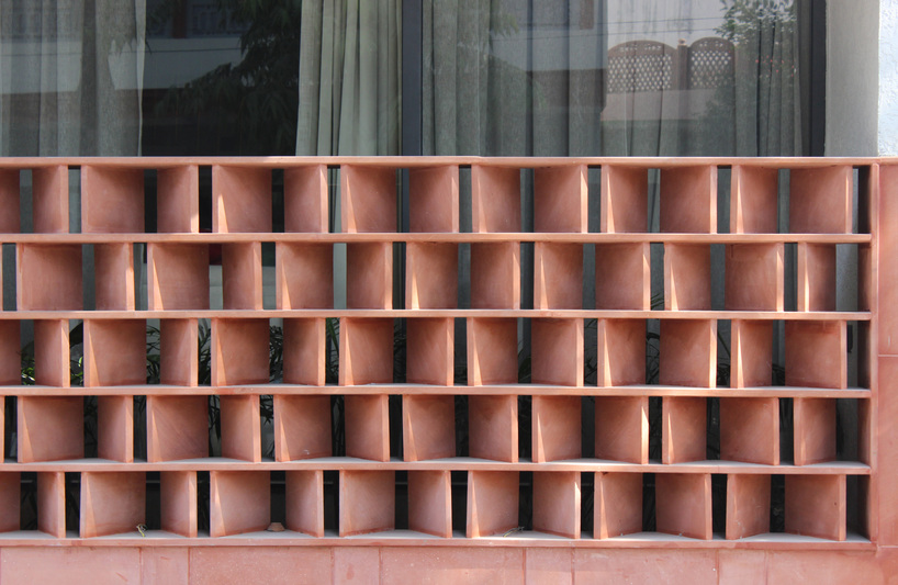 red sandstone jali lattice encloses jaipur house's facade by nuar studios