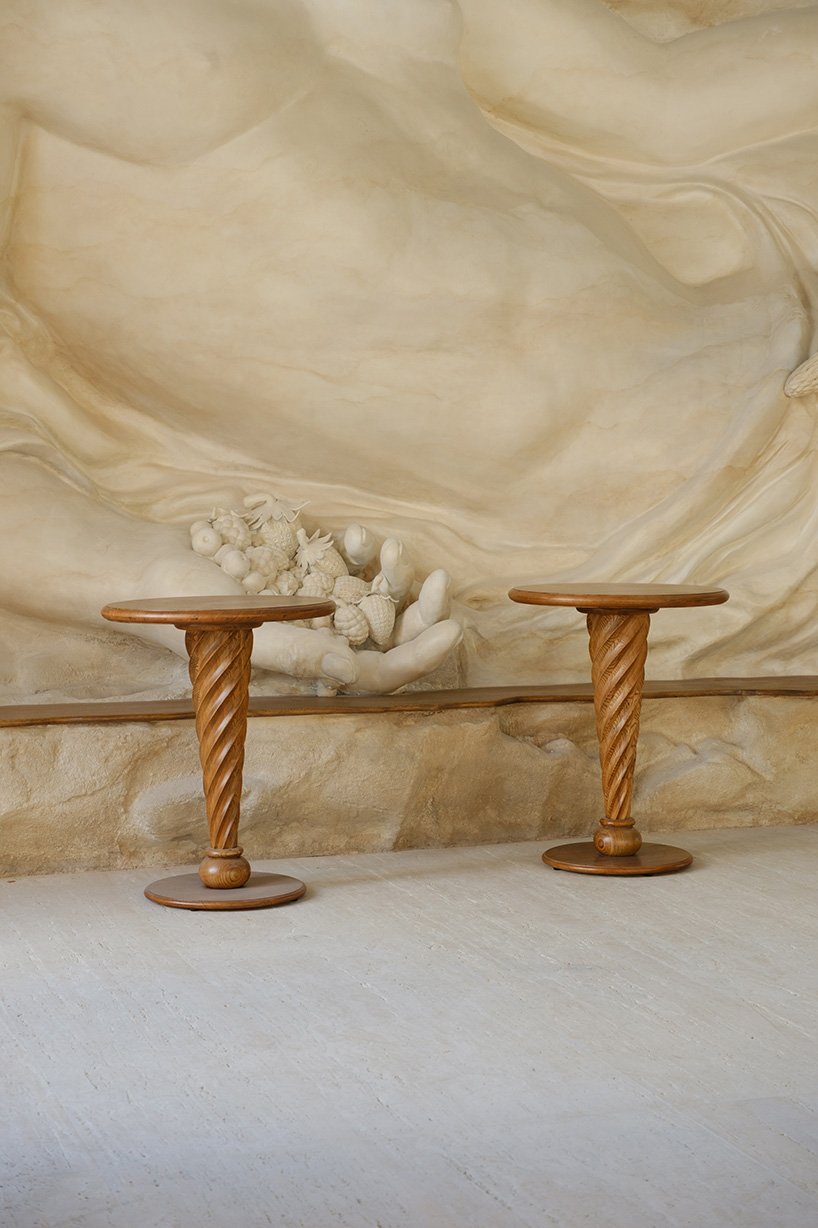 dessert-shaped sculptures in marble and wood ornament ice cream shop in argentina