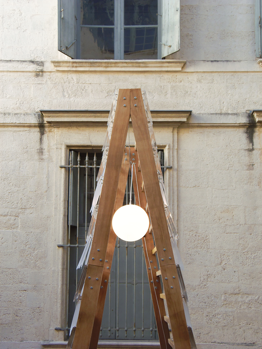 kinetic mirror pavilion's living facade rhythmically reflects french monument for paris 2024