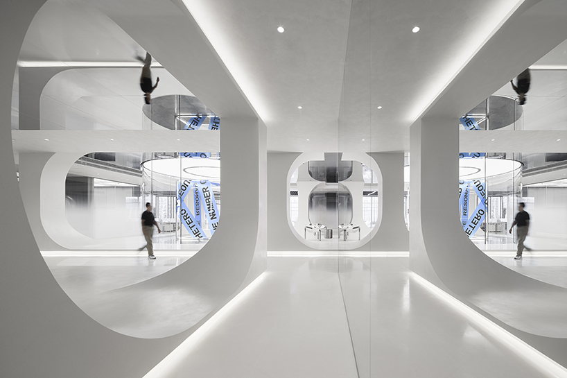 one house design sculpts undulating silhouettes for fluid versatile workspace in shanghai