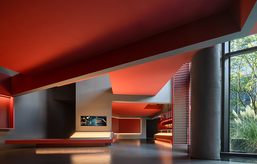red cantilevered volumes outline one house design's shanghai techstorm exhibition hall