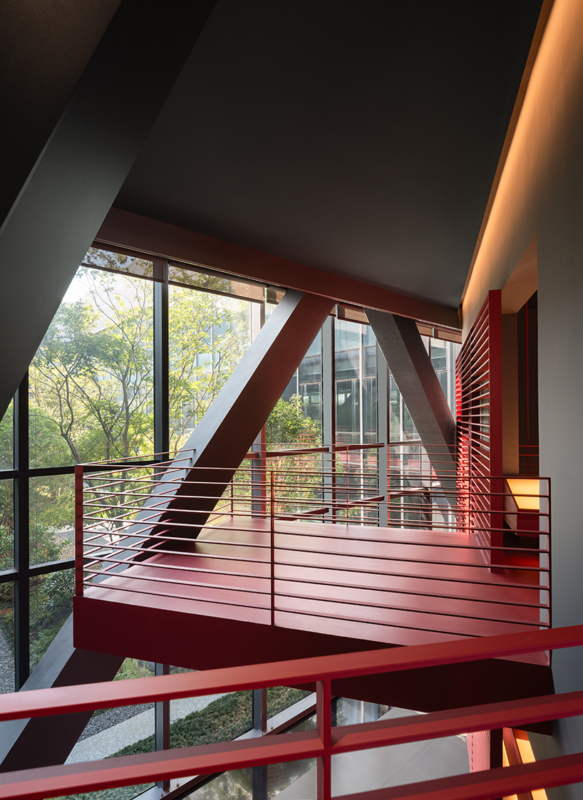 red cantilevered volumes outline one house design's shanghai techstorm exhibition hall