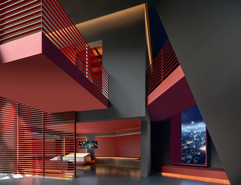 red cantilevered volumes outline one house design's shanghai techstorm exhibition hall