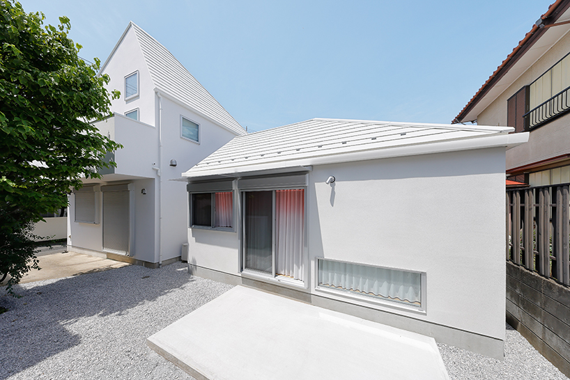 shifted roofs and reflected light connect old and new homes in suburban tokyo - 2