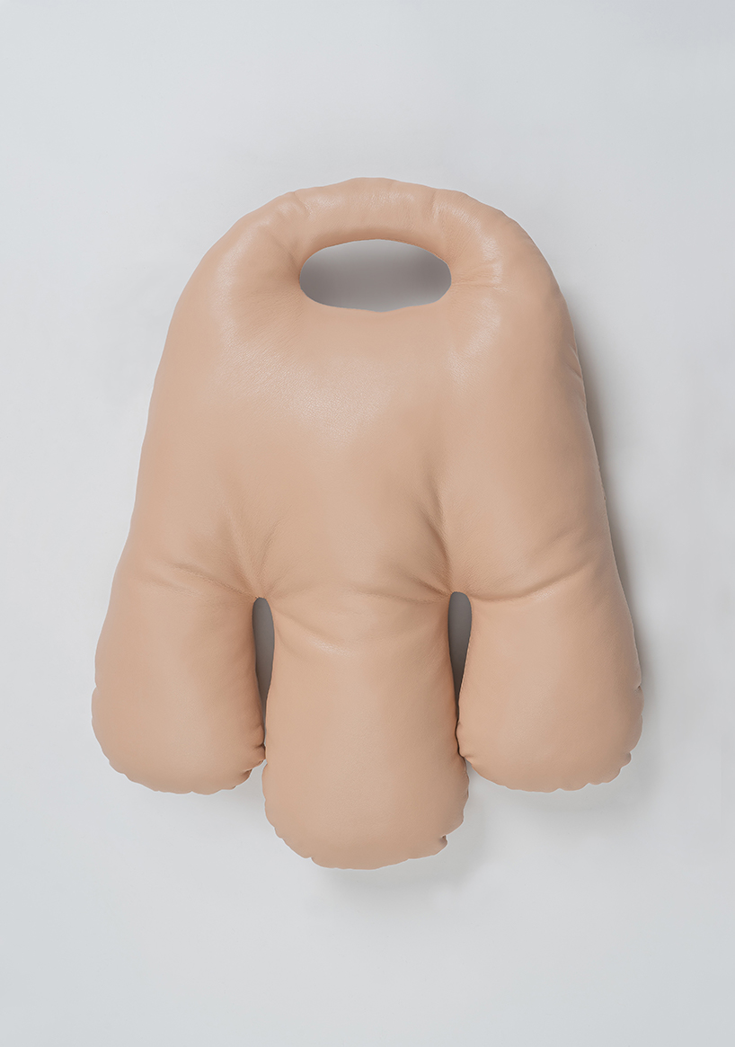 KKEKK's fantastical bags imagine oversized human hands to carry your belongings