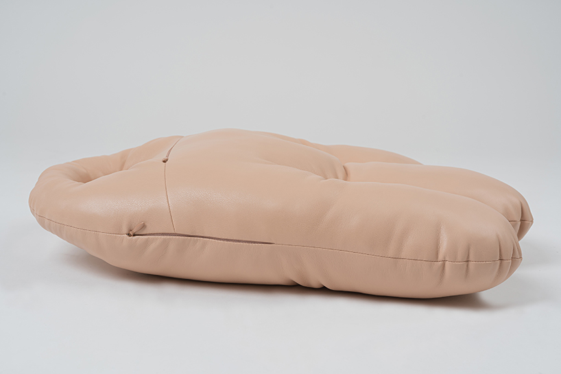 KKEKK's fantastical bags imagine oversized human hands to carry your belongings