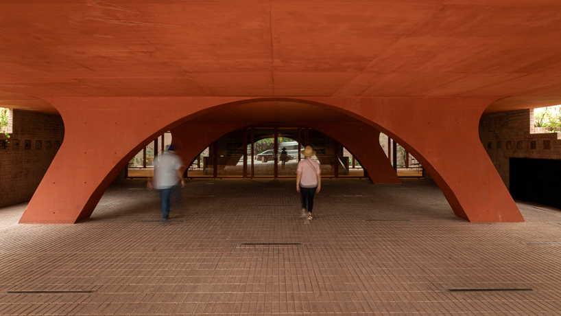 cast in red-pigmented concrete, la cacaotera museum celebrates cacao heritage in mexico - 5
