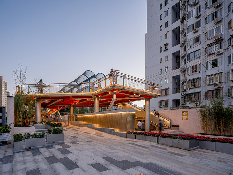 atelier liu yuyang architects transforms former rail line into vine-like walking belt in shanghai