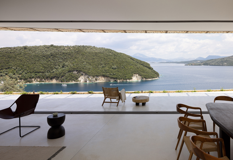 thyta house's curvilinear silhouettes run along the mountainous landscape of lefkada, greece