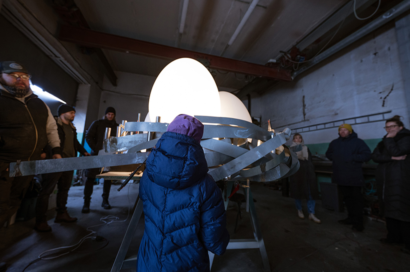 5-year-old’s sketch turns light mast into luminous bird's nest installation in estonia