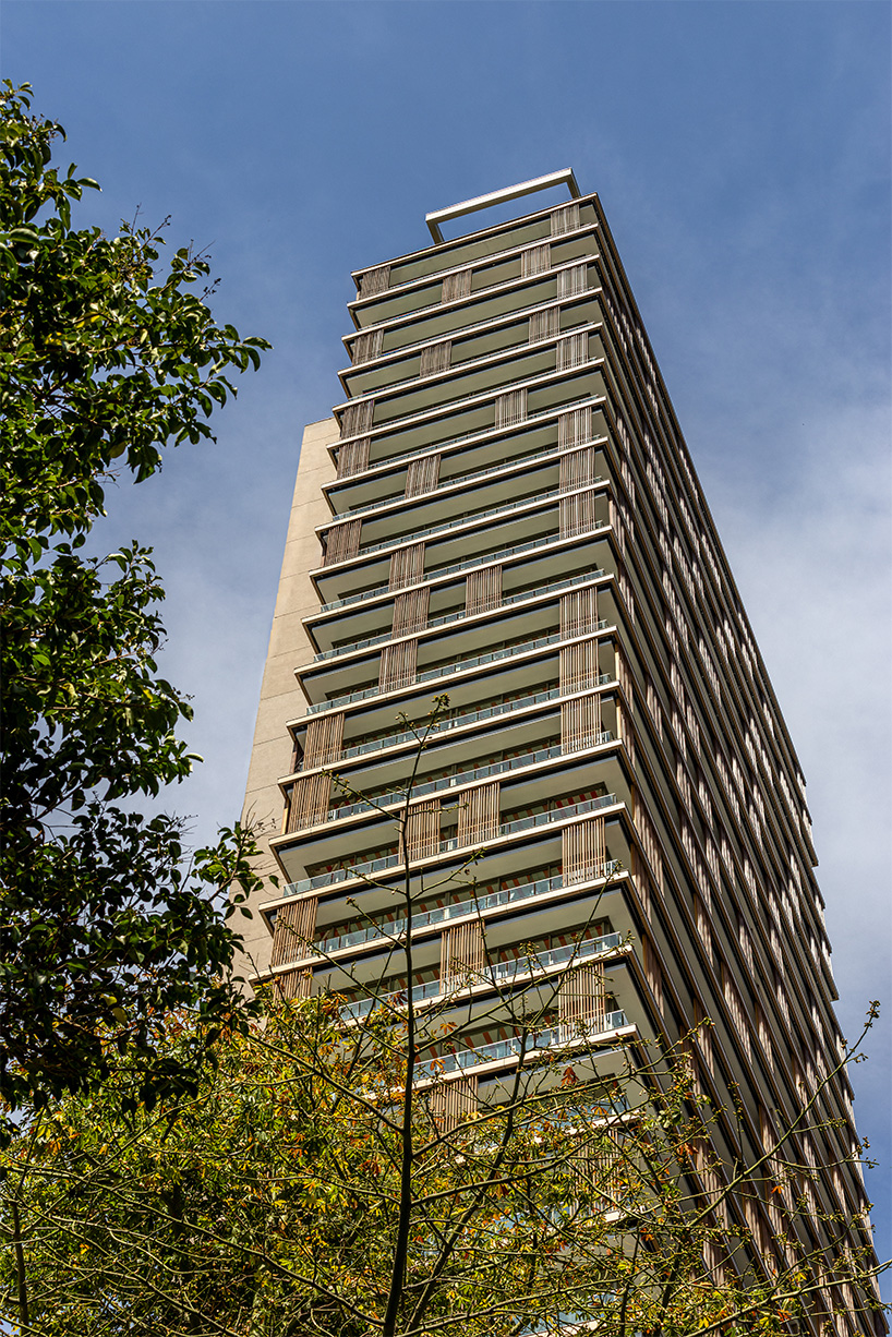 kinetic wooden panels run across residential tower's facade by perkins&will in s&atilde;o paulo