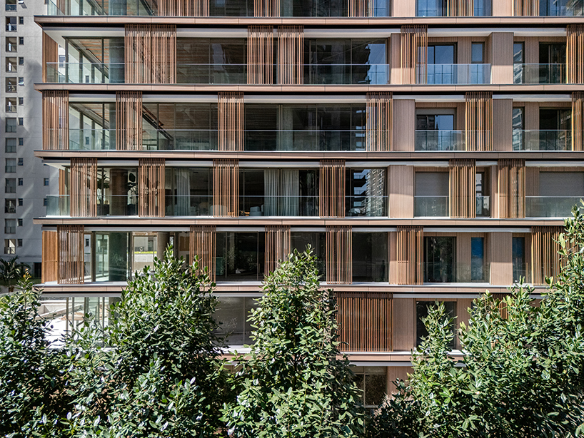 kinetic wooden panels run across residential tower's facade by perkins&will in s&atilde;o paulo