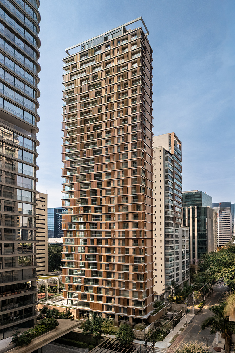 kinetic wooden panels run across residential tower's facade by perkins&will in s&atilde;o paulo