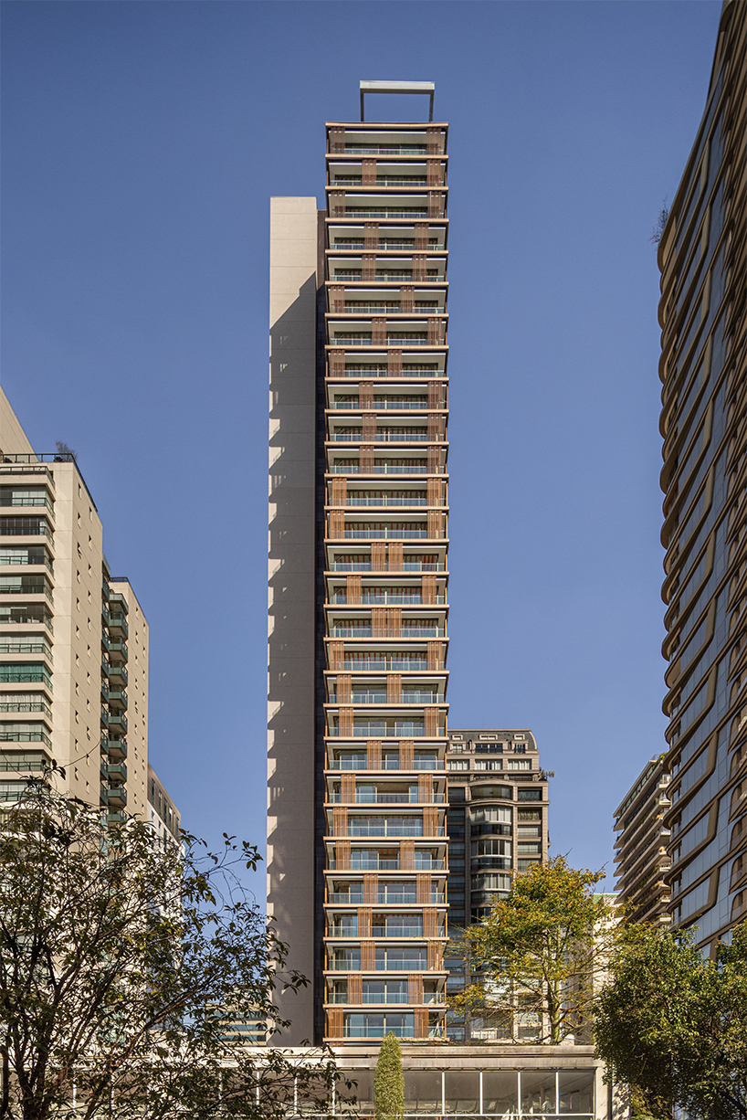 kinetic wooden panels run across residential tower's facade by perkins&will in s&atilde;o paulo