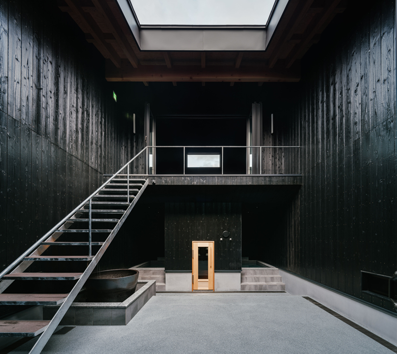 charred cedar facade enfolds kiln-inspired sauna in japan