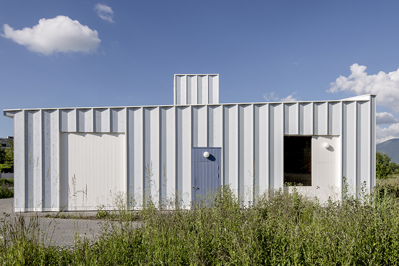 daniel holfeld captures gardeners house's pleated facade by cabinet studio in geneva