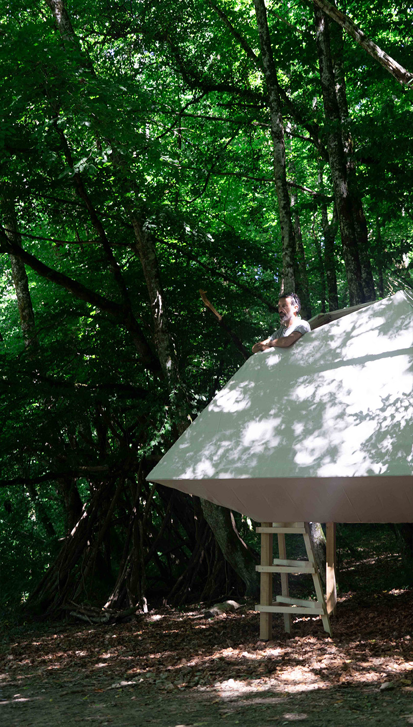 meaningless architecture's meditation cabin lights up like a lantern in french woodlands