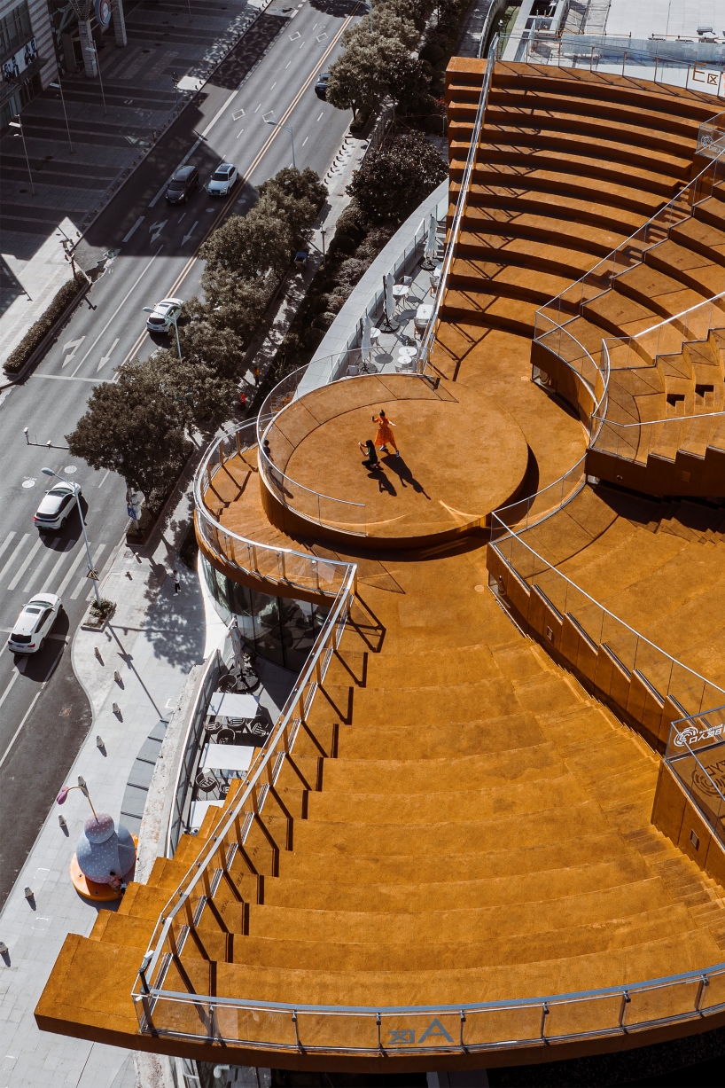 skybowl rooftop amphitheater by sopa integrates qingdao's urban fabric with the bayfront