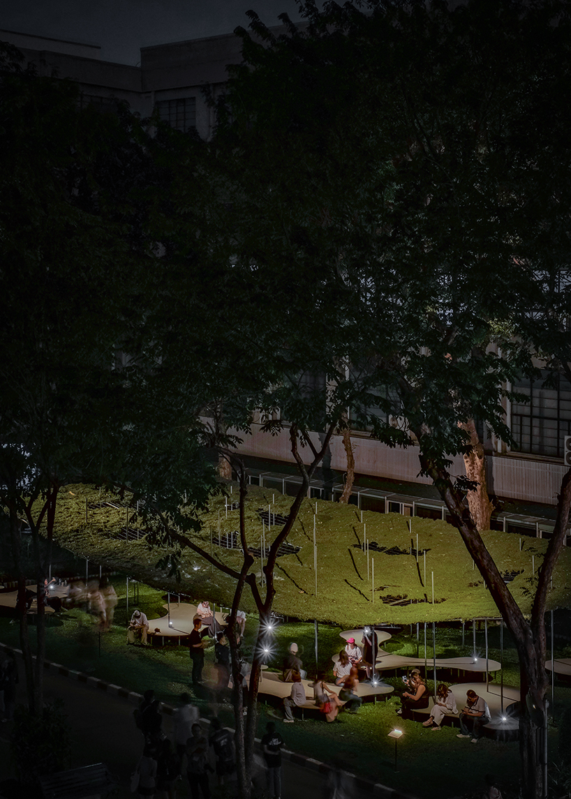 people pavilion's decomposed grass canopy shades over free-form circular seating