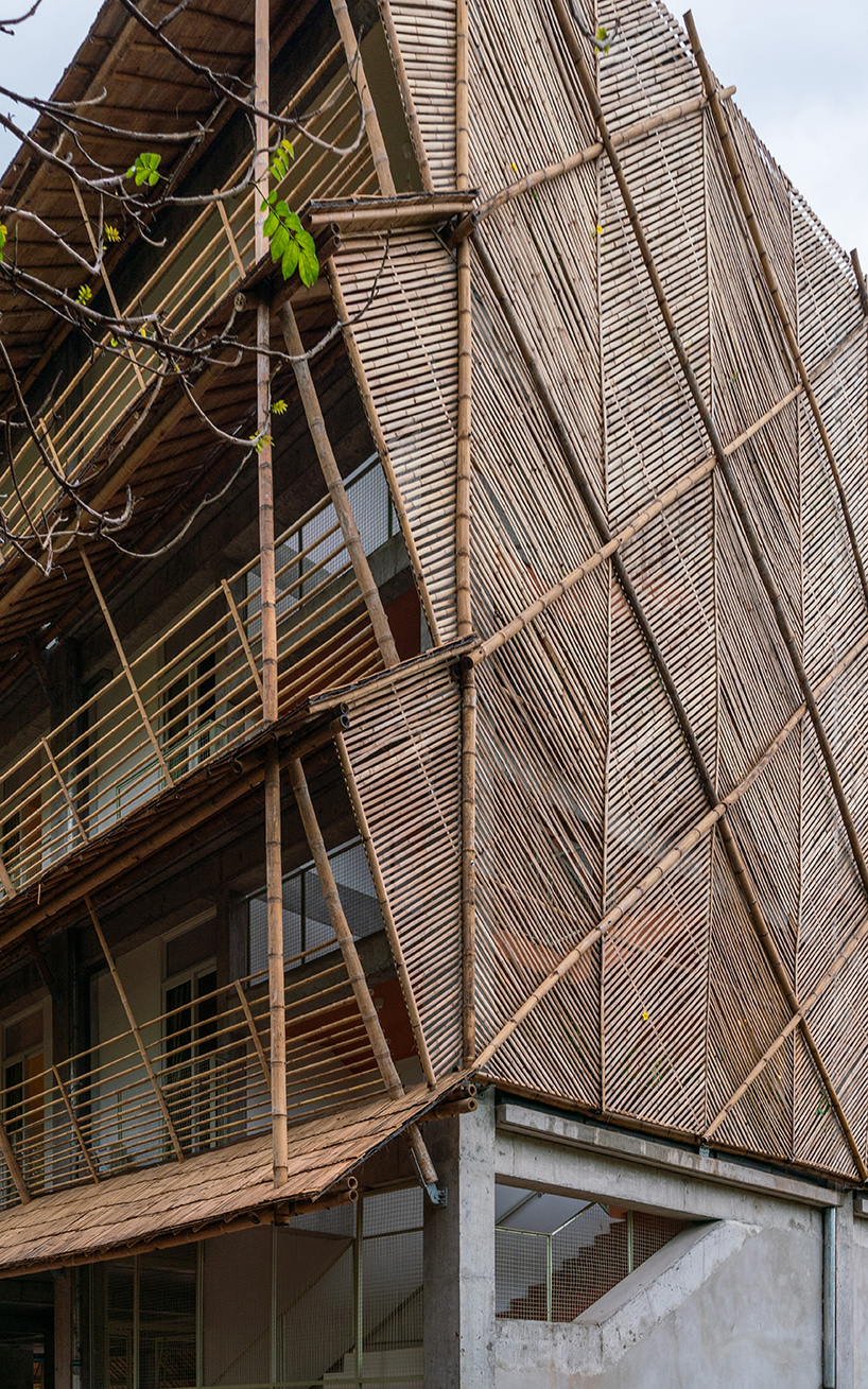 BLOOM screens girl dormitory's concrete skeleton with woven bamboo skin