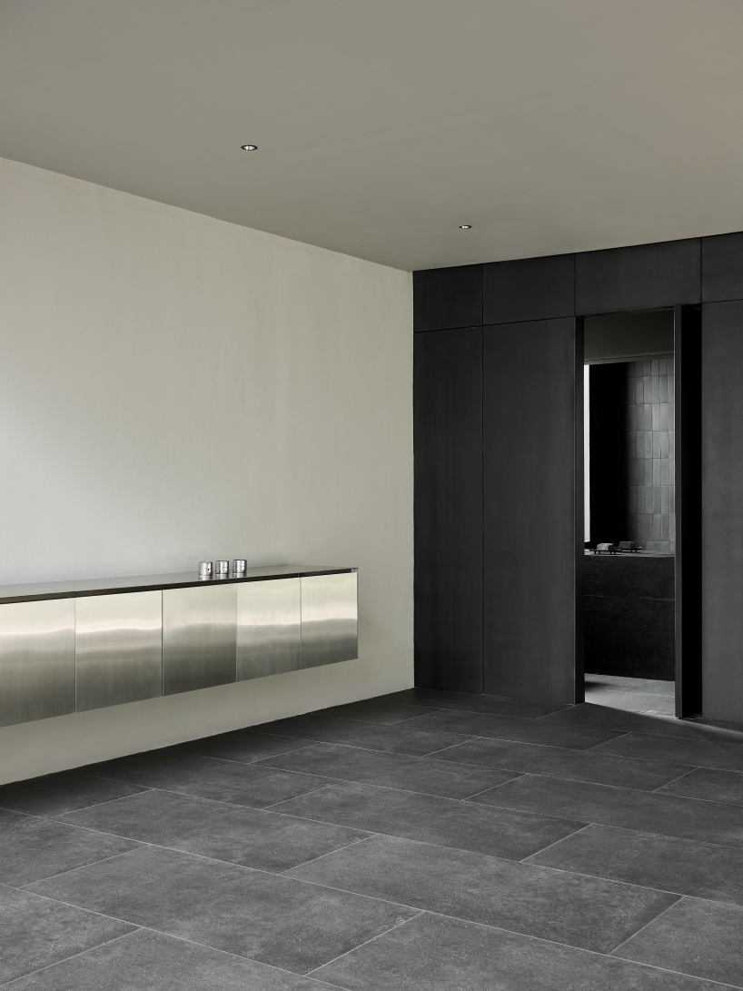 tattoo atelier and residence merge within angular casa T sculpted by SSAA in bangkok