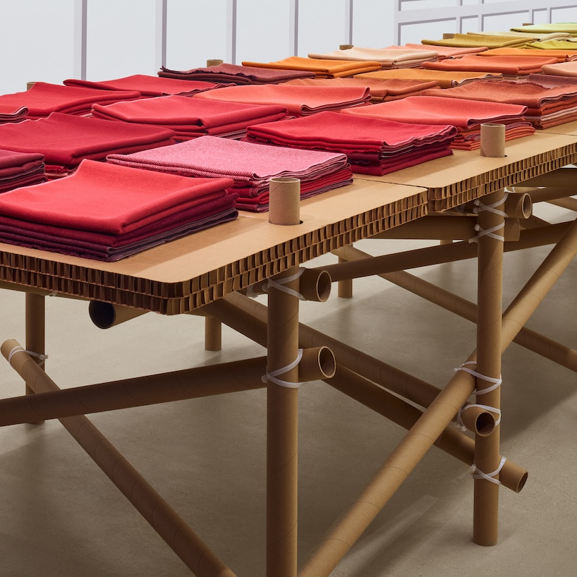 cardboard, paper tubes, and zip ties shape designtex and standard issue design's table