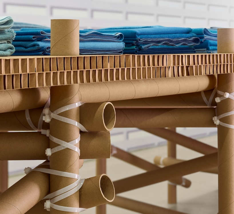 cardboard, paper tubes, and zip ties shape designtex and standard issue design's table