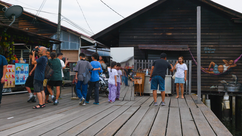 kaito sakuma's liquid mirror creates rippling reflections around malaysia's historic penang