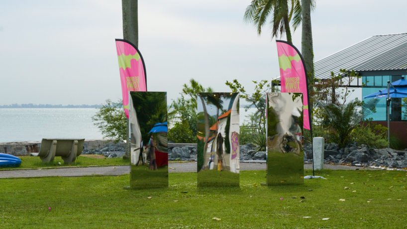 kaito sakuma's liquid mirror creates rippling reflections around malaysia's historic penang