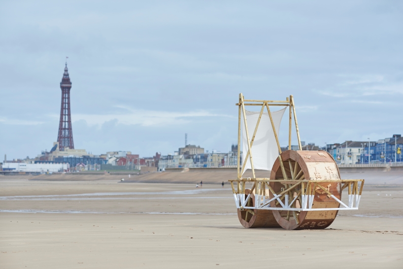 futurefarmers' wooden beachship rolls along blackpool coastline inviting collaboration