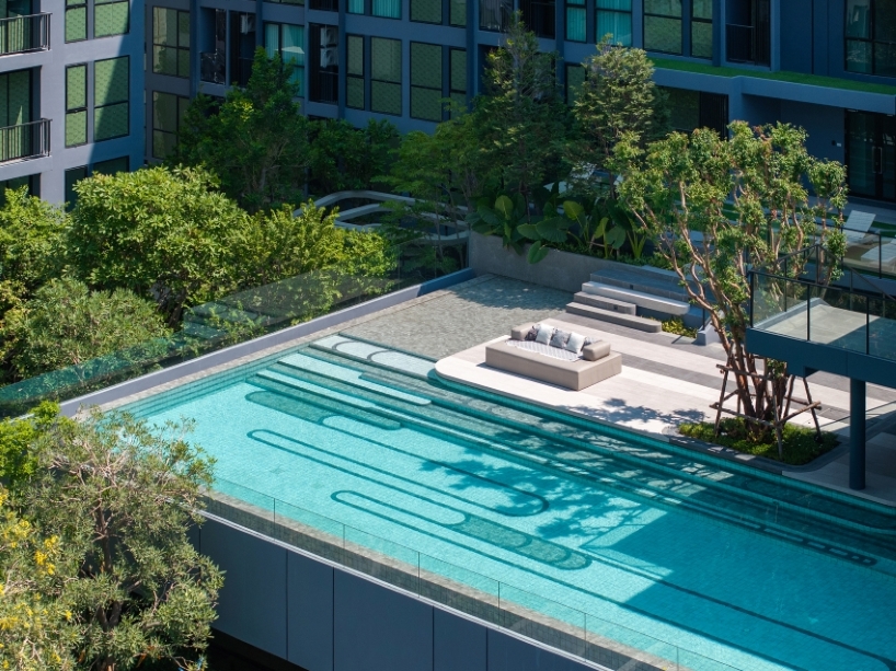fingerprint patterns inform sculptural landscape design within bangkok housing complex