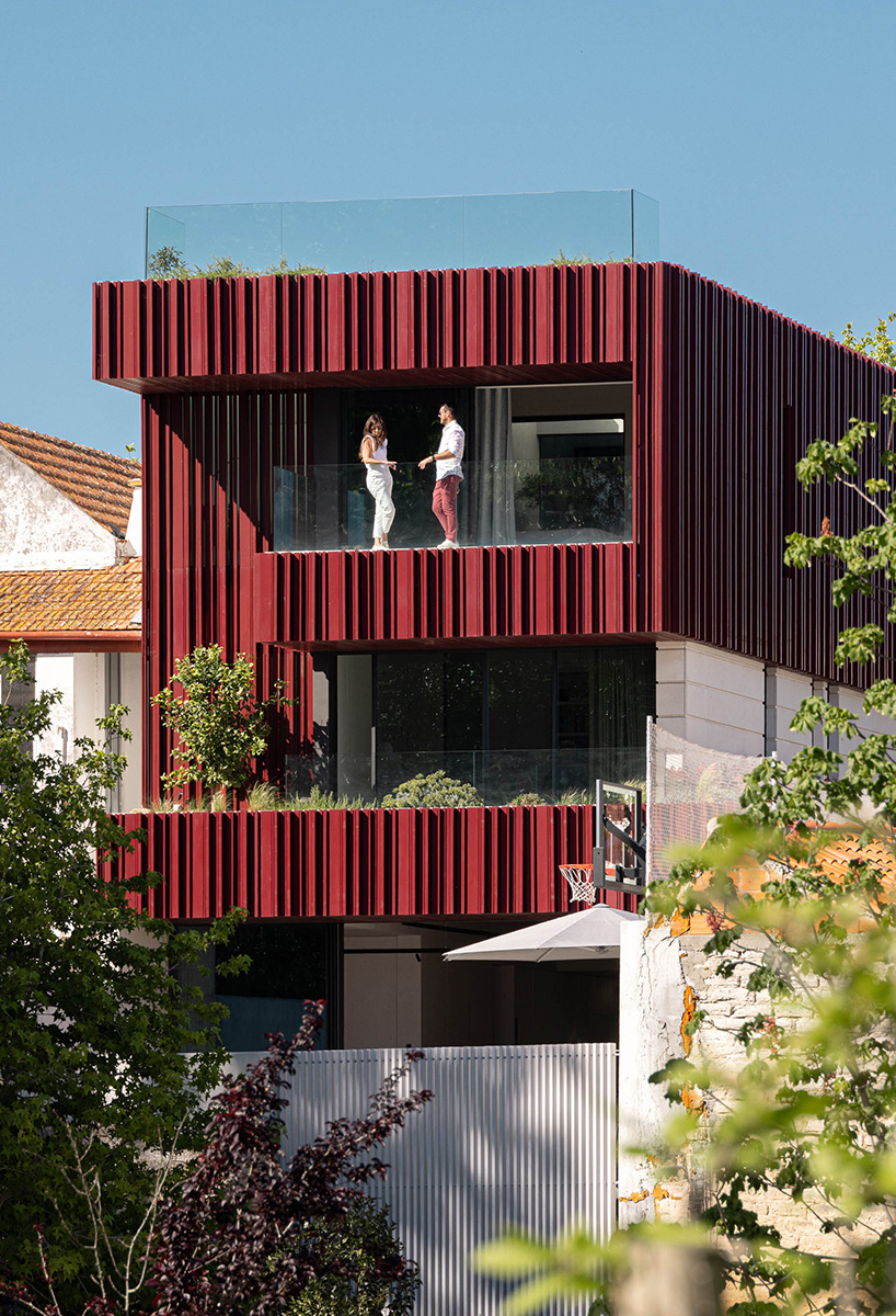 red timber-clad skin covers the Art Nouveau façade of the parking garage in Aveiro