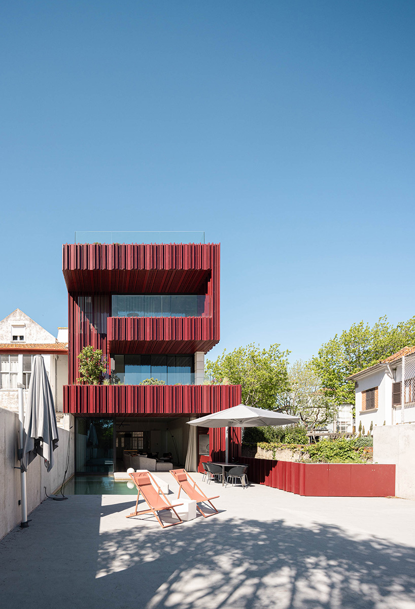 red timber-clad skin covers the Art Nouveau façade of the parking garage in Aveiro