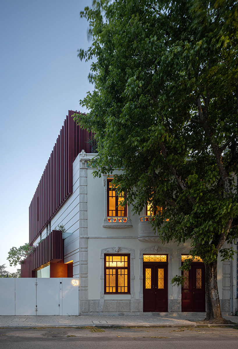 red timber-clad skin covers the Art Nouveau façade of the parking garage in Aveiro