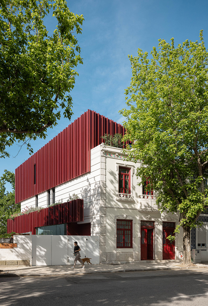 red timber-clad skin covers the Art Nouveau façade of the parking garage in Aveiro