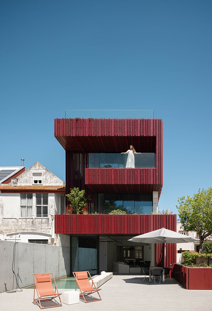 red timber-clad skin covers the Art Nouveau façade of the parking garage in Aveiro