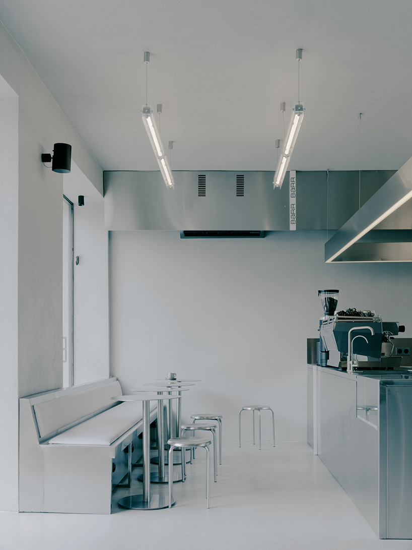 the silver toned bloom industrial minimalism and organic vitality at cafe flower shop 1