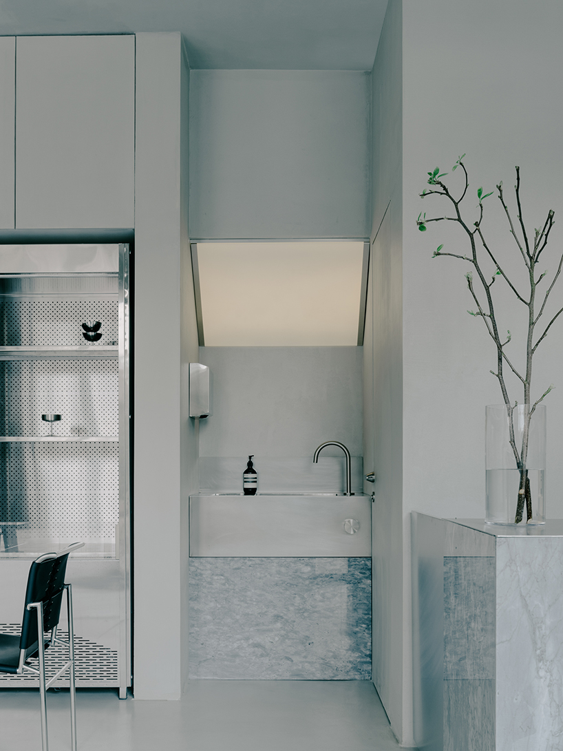 the silver toned bloom industrial minimalism and organic vitality at cafe flower shop 3