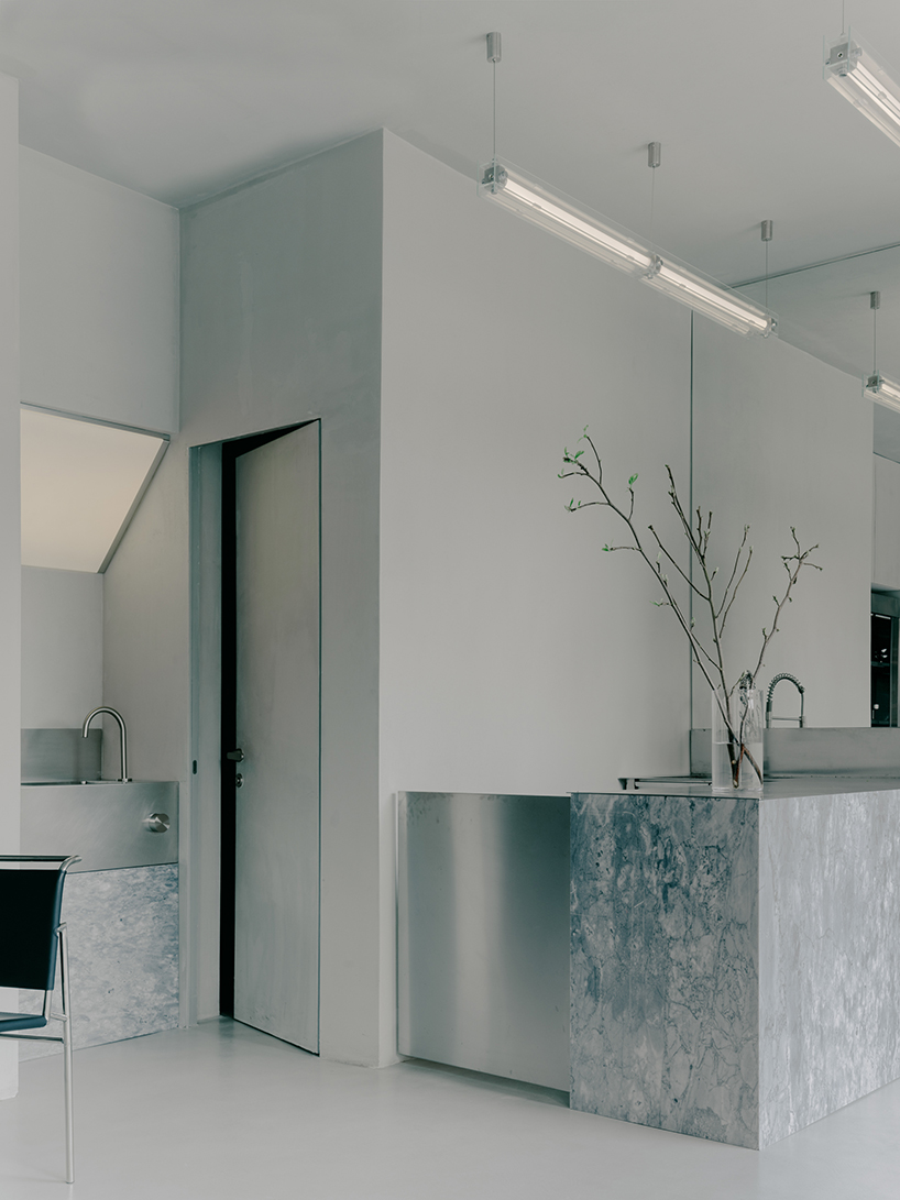 the silver toned bloom industrial minimalism and organic vitality at cafe flower shop 4